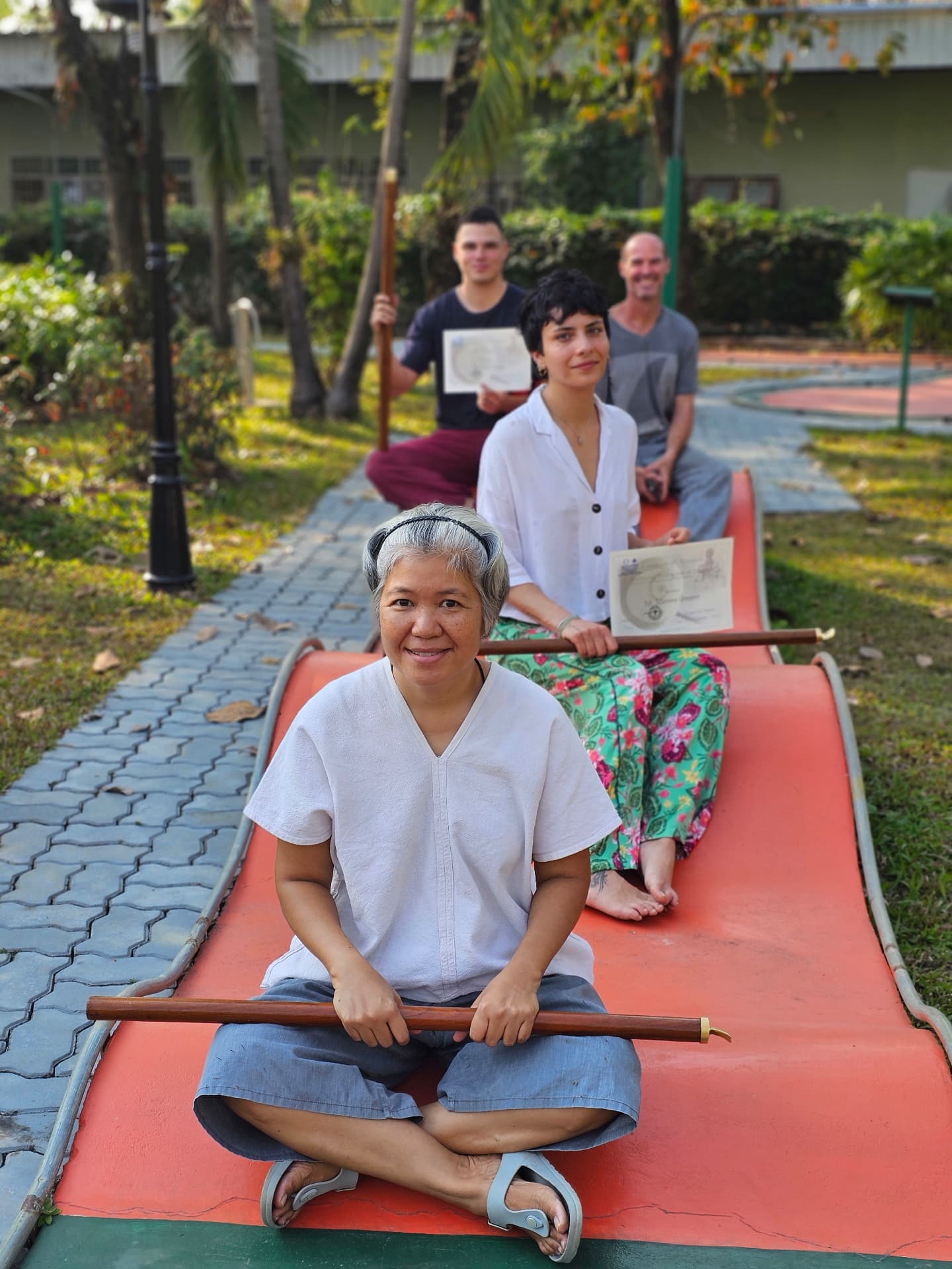 Dr. Sirichan with students at Green Oasis Resort